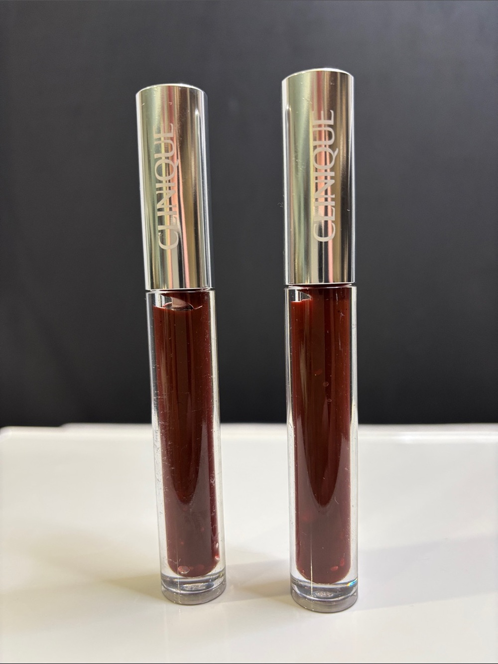 Clinique Duo Liquid Lip Gloss in 01 Black Honey Pop